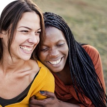 two people smiling