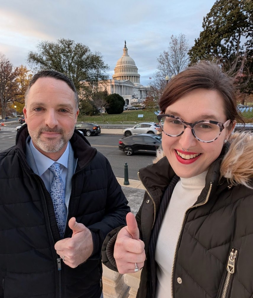 Nick Saltsman, PharmD, RPh, AAHIVP (he/him) and Rhea Debussy, PhD (she/her) of Equitas Health, following a day of 13 congressional meetings on Capitol Hill. Photo Credit: Equitas Health